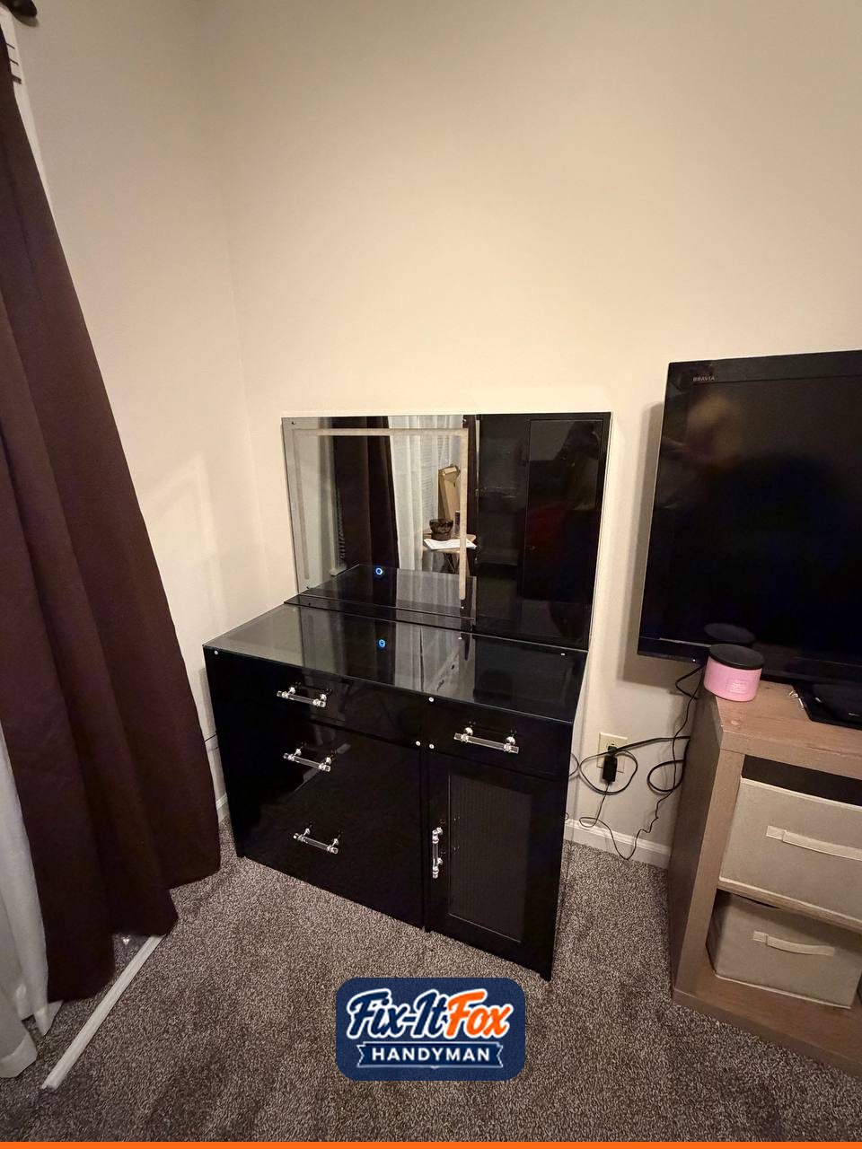 Assembled black gloss vanity desk with drawers, cabinet and lighted mirror
